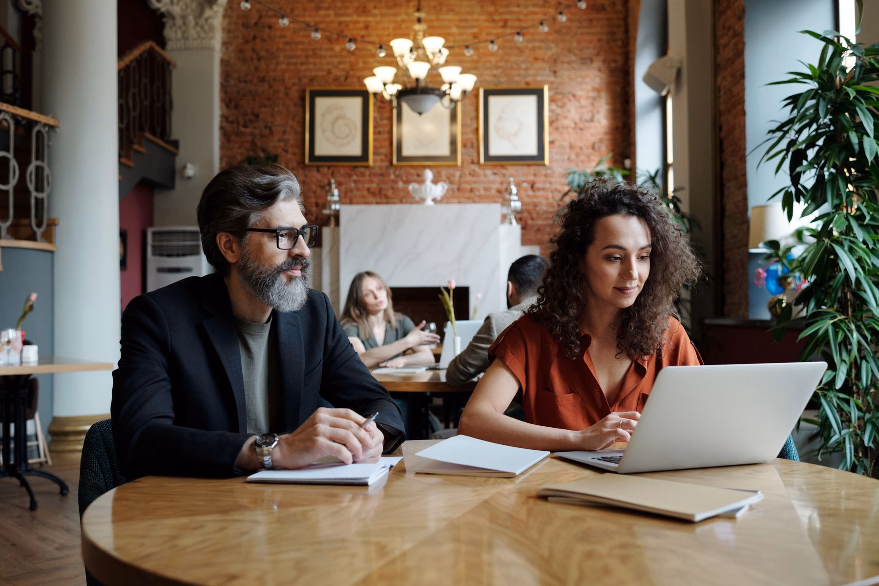 Two self-employed business partners working together on their business